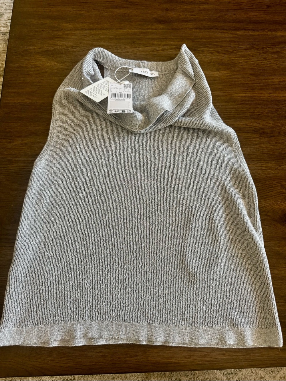 Kinitted top with drape neckline
